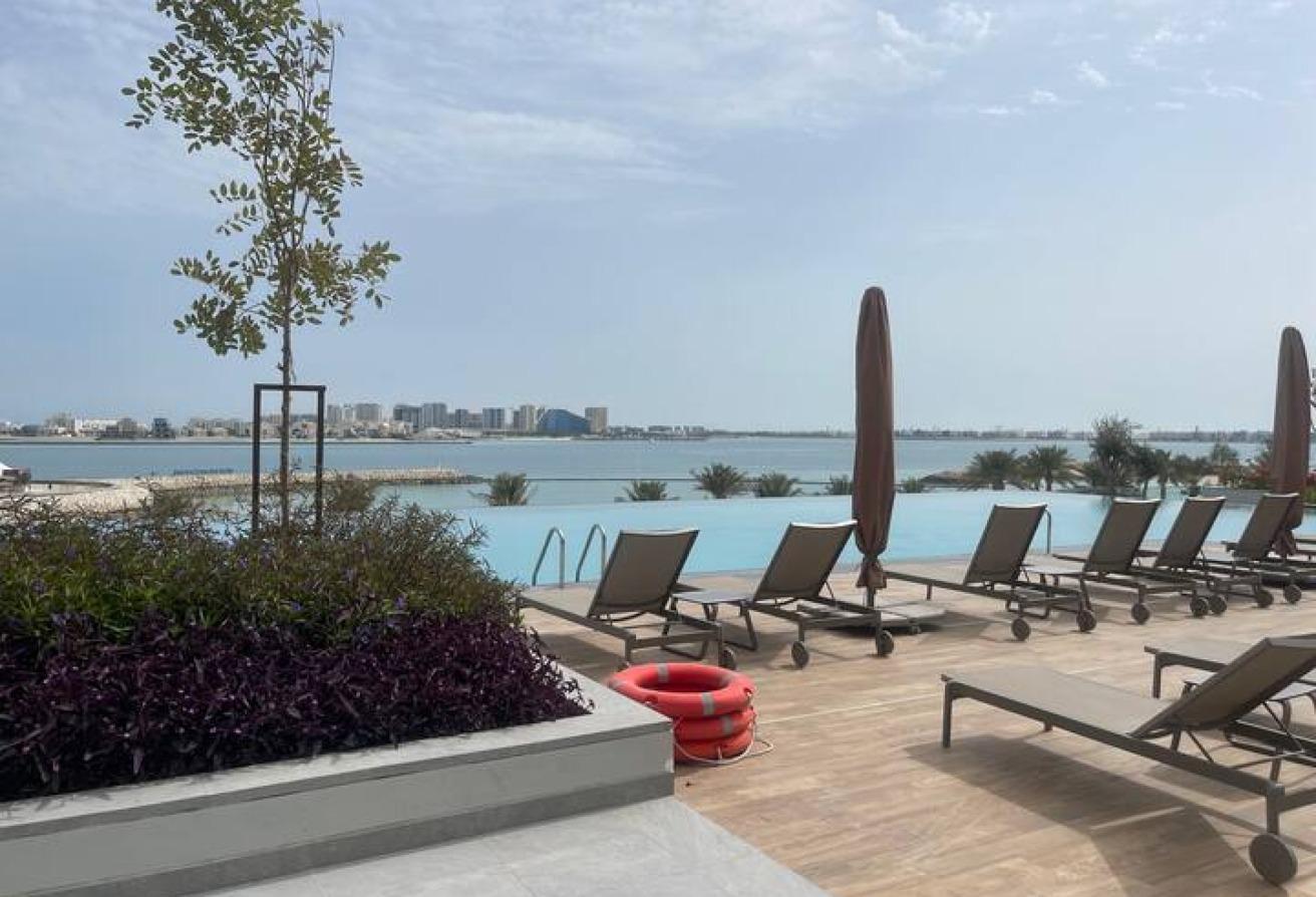 Golden Visa Eligible -1BR Beachfront Investment