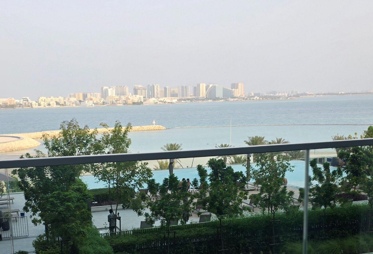 Golden Visa Eligible -1BR Beachfront Investment