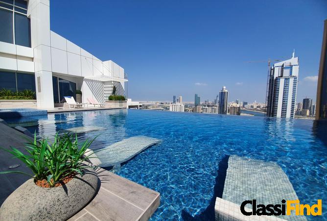 شقة 1br جديدة تمامًا بنظام تملّك حر (Freehold) – أنيقة + شرفة