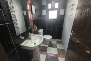 For Sale: Residential Apartment with Sea View on Fourth Floor in Um Al Hassam