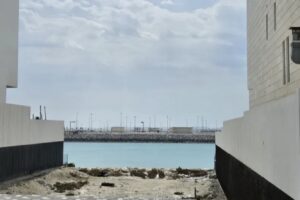 Investment Opportunity: Land for Sale in Dilmunia with Direct Seafront View