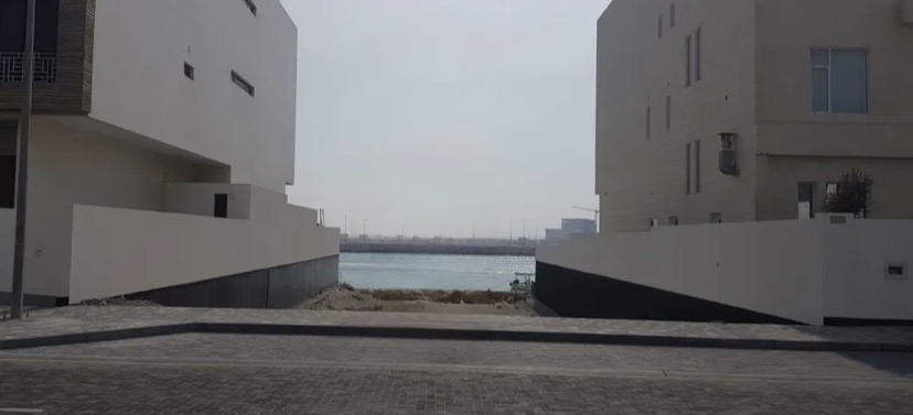 Investment Opportunity: Land for Sale in Dilmunia with Direct Seafront View