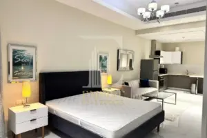 Spacious Studio for Rent in Seef with High Floor Sea View