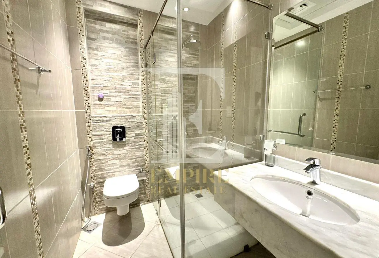 Spacious Studio for Rent in Seef with High Floor Sea View
