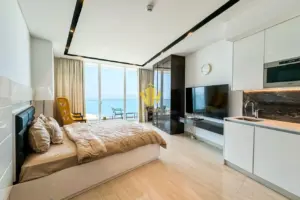 Spacious Seef Apartment for Rent | New, Sea View, Balcony, Beach Access, WiFi Included