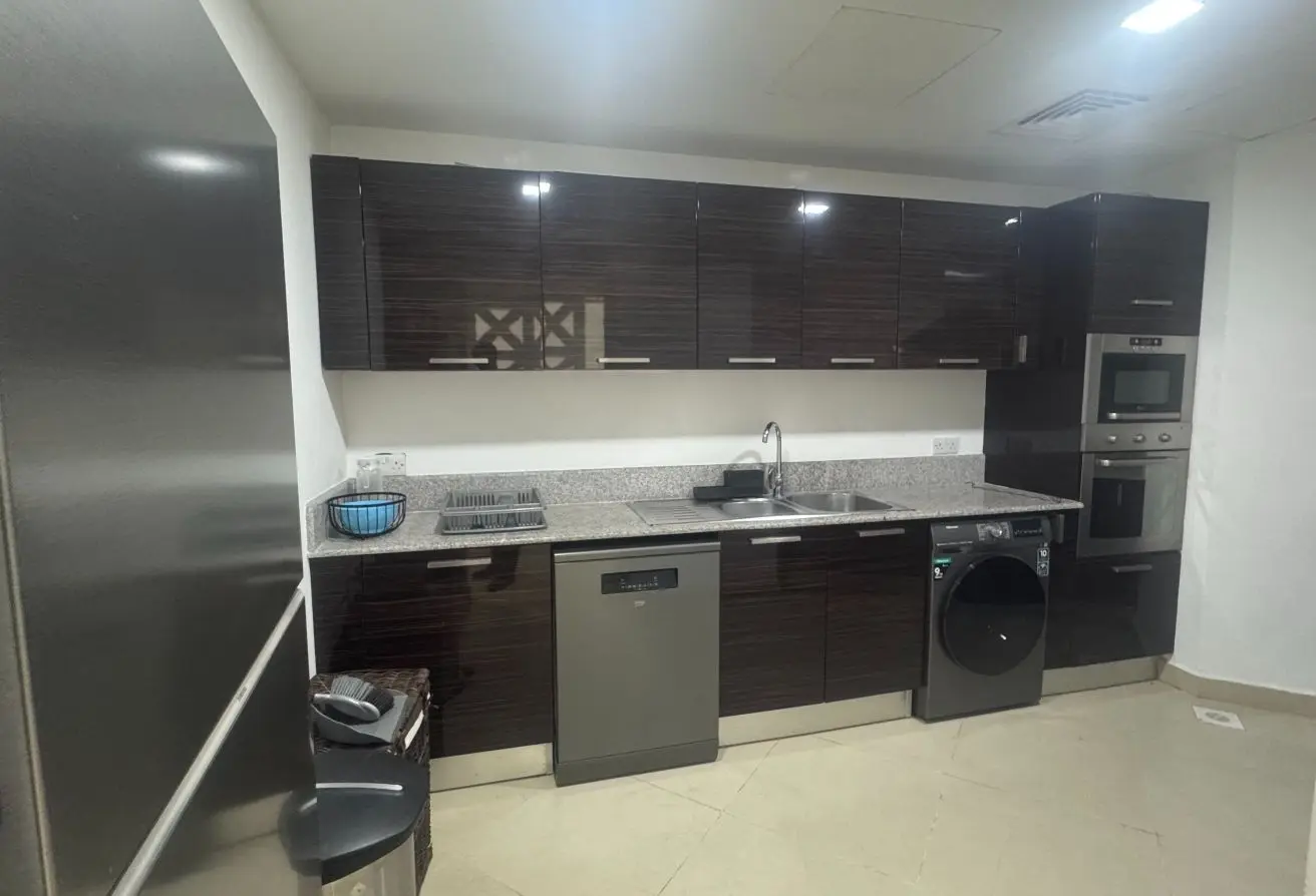 Spacious 2-Bedroom Apartment with Balcony on Top Floor for Sale in Sanabis