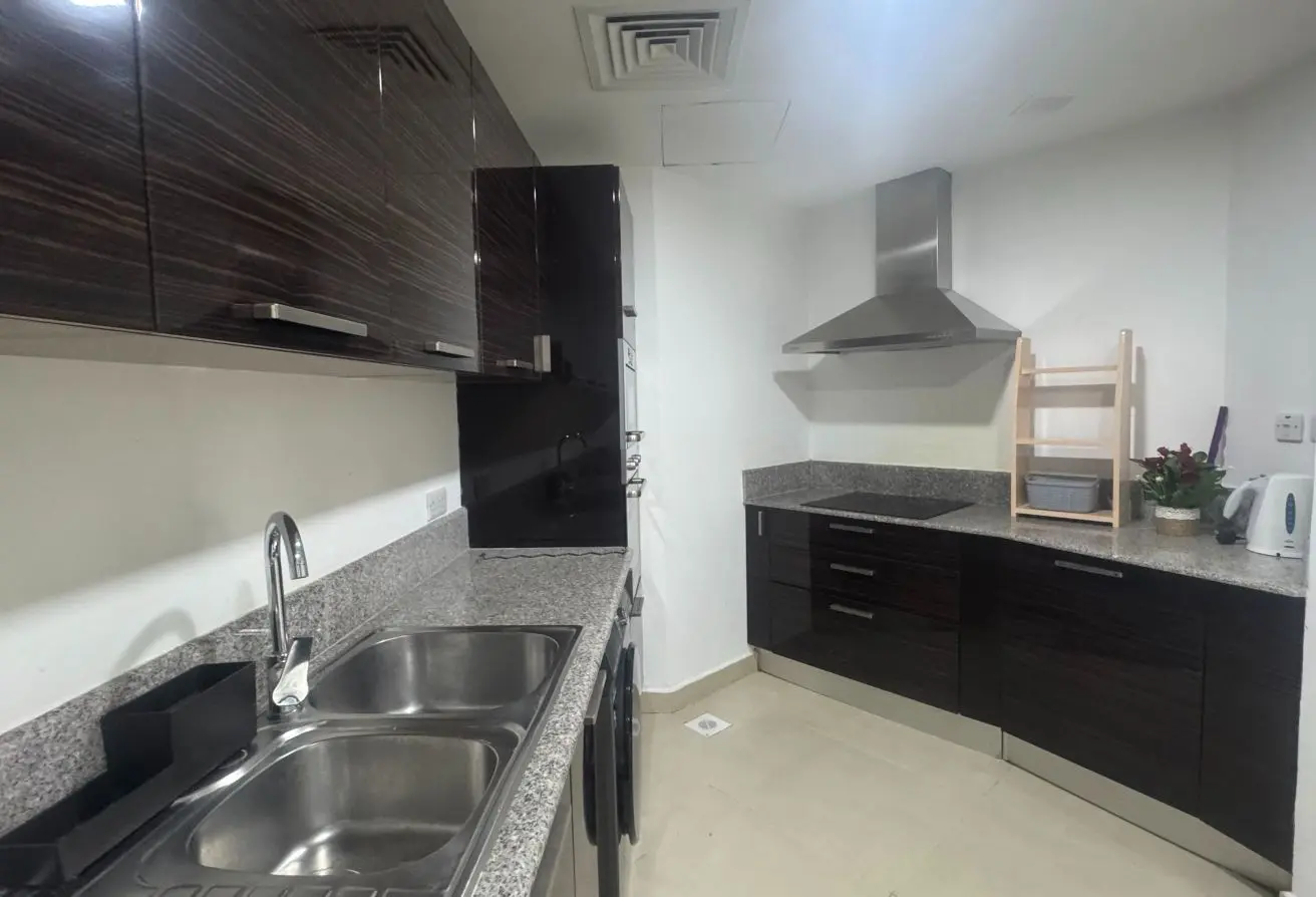 Spacious 2-Bedroom Apartment with Balcony on Top Floor for Sale in Sanabis