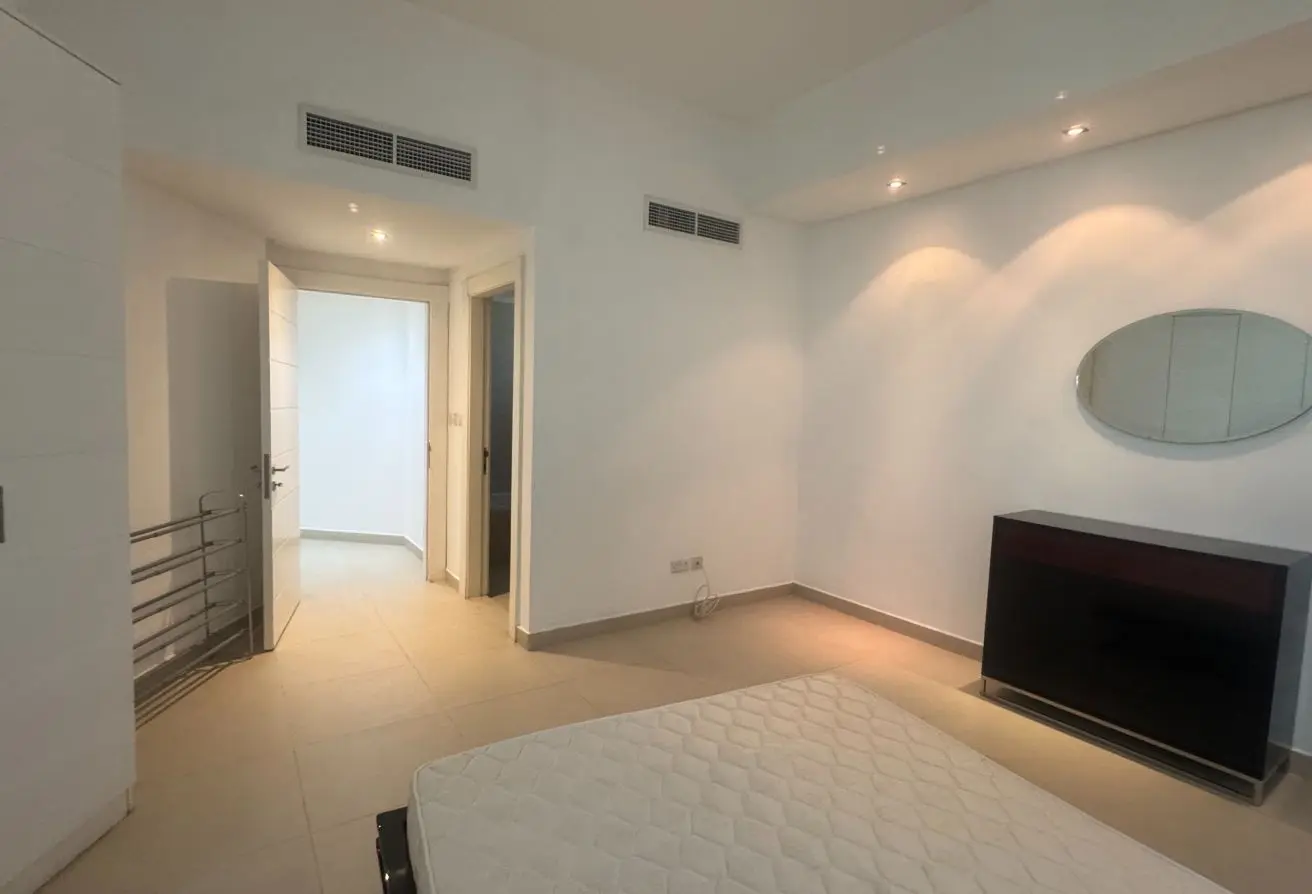 Spacious 2-Bedroom Apartment with Balcony on Top Floor for Sale in Sanabis