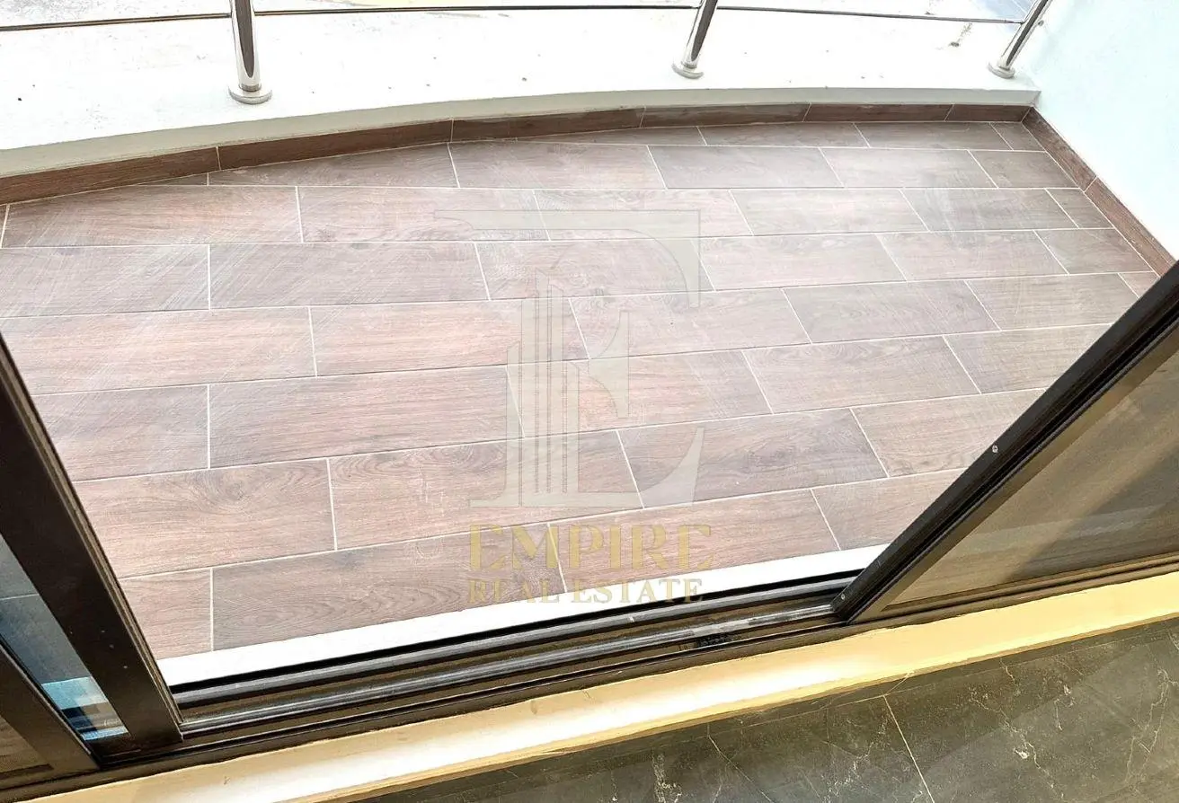 Spacious 3-Bedroom Apartment with Fully Fitted Kitchen, Balcony View, and EWA Included