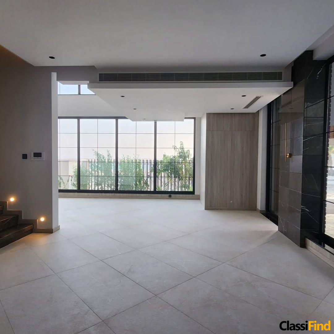 فيلا للبيع في جزيرة دلمونيا مصممة بطريقة مبتكرة وأنيقة ارتفاع مزدوج