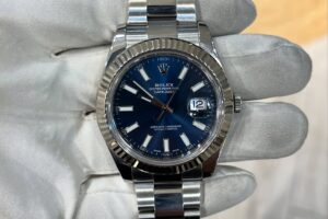 Rolex Datejust White gold bezel Oyster steel Blue index Reference 116334