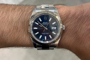 Rolex Datejust White gold bezel Oyster steel Blue index Reference 116334