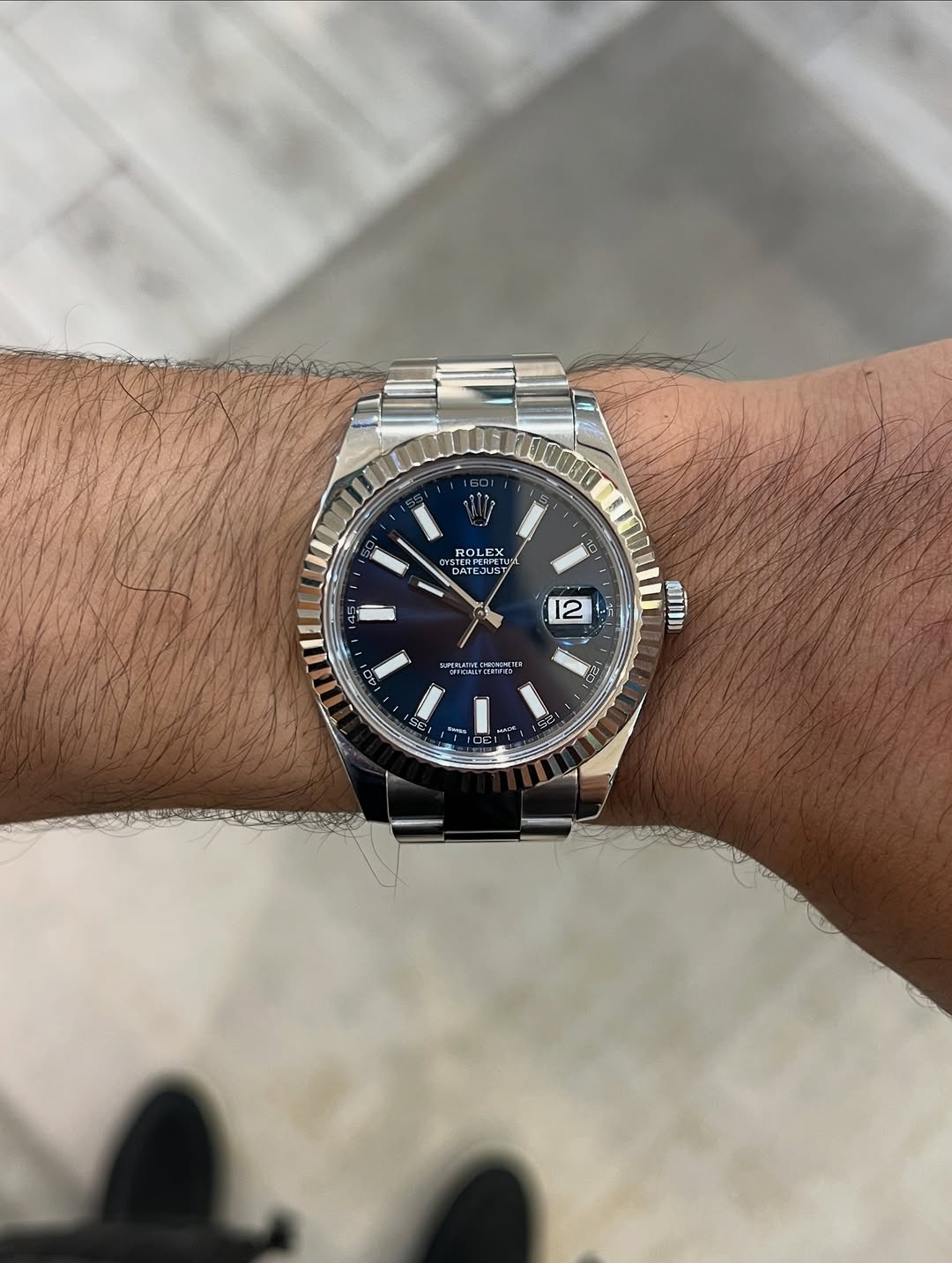 Rolex Datejust White gold bezel Oyster steel Blue index Reference 116334