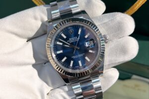 Rolex Datejust White gold bezel Oyster steel Blue index Reference 116334