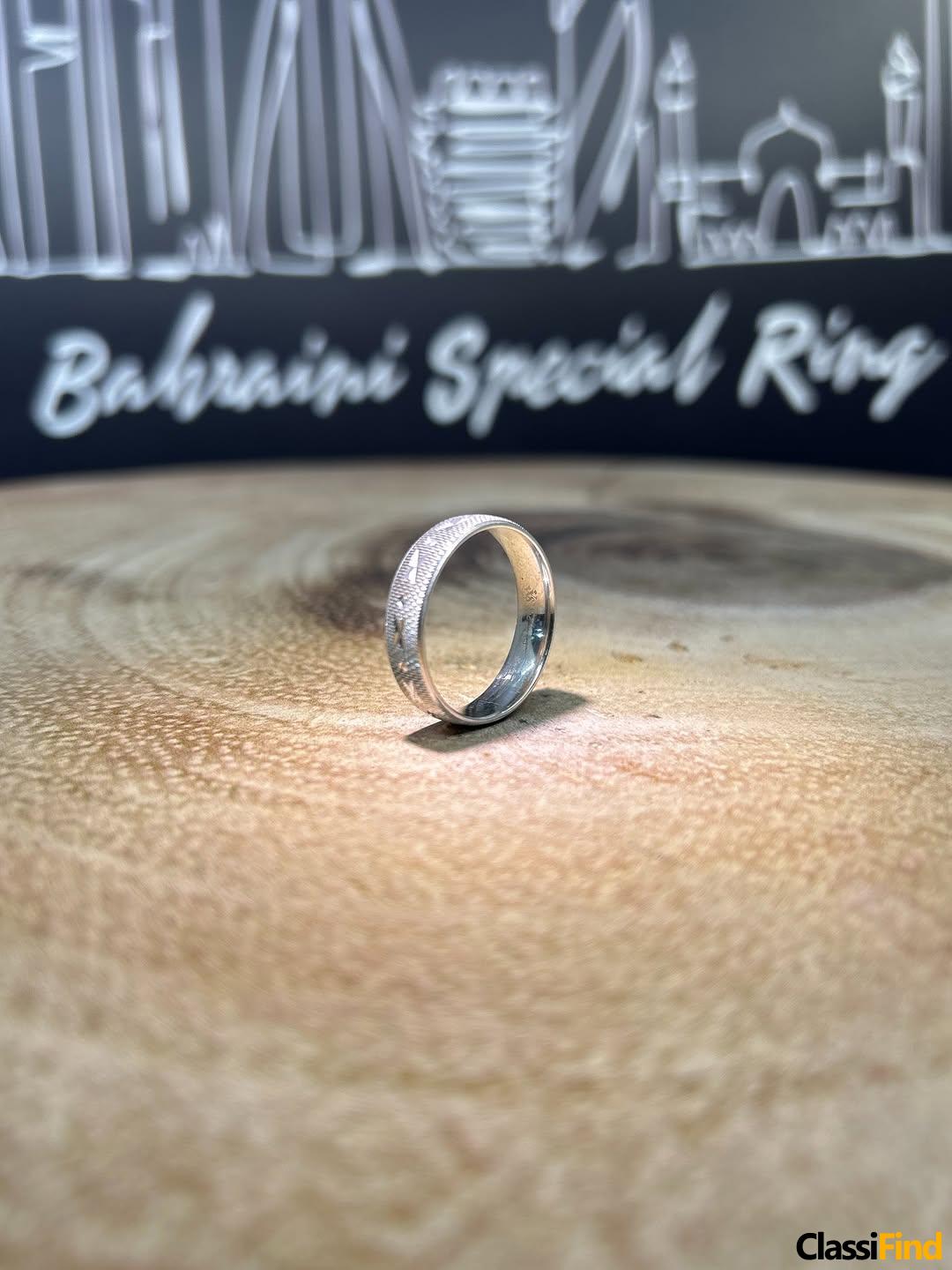 Design – Diamond Cuts Bahraini silver engagement band