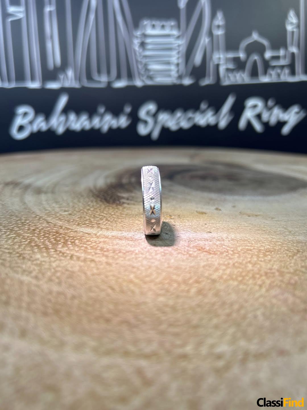 Design – Diamond Cuts Bahraini silver engagement band