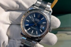 Rolex Datejust White gold bezel Oyster steel Blue index Reference 116334