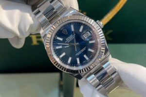 Rolex Datejust White gold bezel Oyster steel Blue index Reference 116334