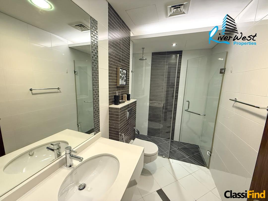 Spacious 1-bedroom haven with stunning city views in Juffair 🏙️
