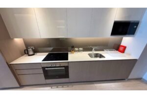 A luxurious, fully furnished studio apartment with a sea view