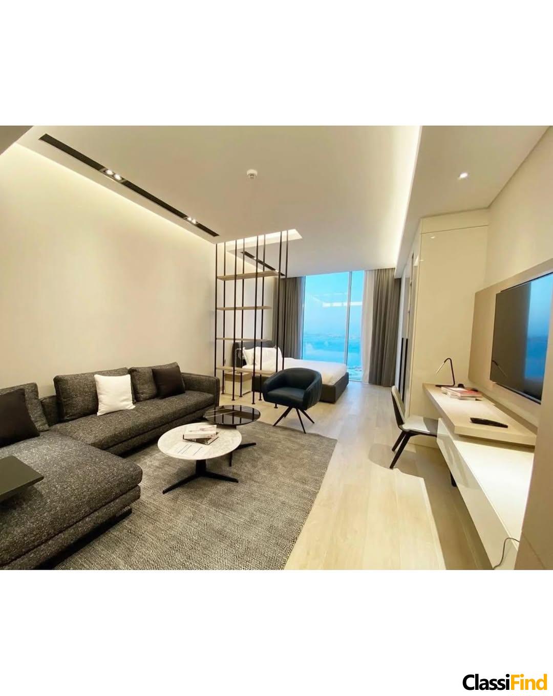 A luxurious, fully furnished studio apartment with a sea view