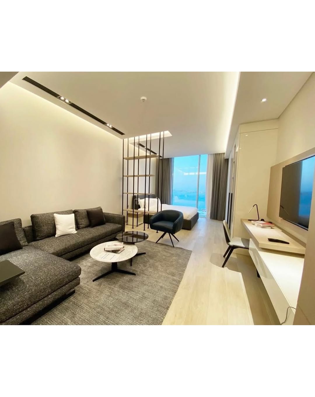 A luxurious, fully furnished studio apartment with a sea view