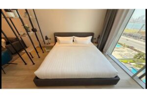 A luxurious, fully furnished studio apartment with a sea view