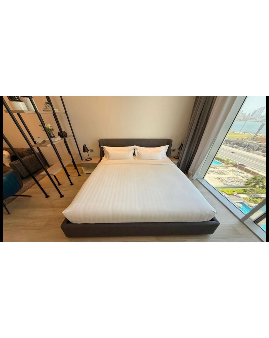 A luxurious, fully furnished studio apartment with a sea view