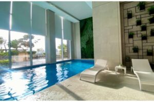 A luxurious, fully furnished studio apartment with a sea view