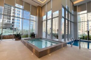 A luxurious, fully furnished studio apartment with a sea view