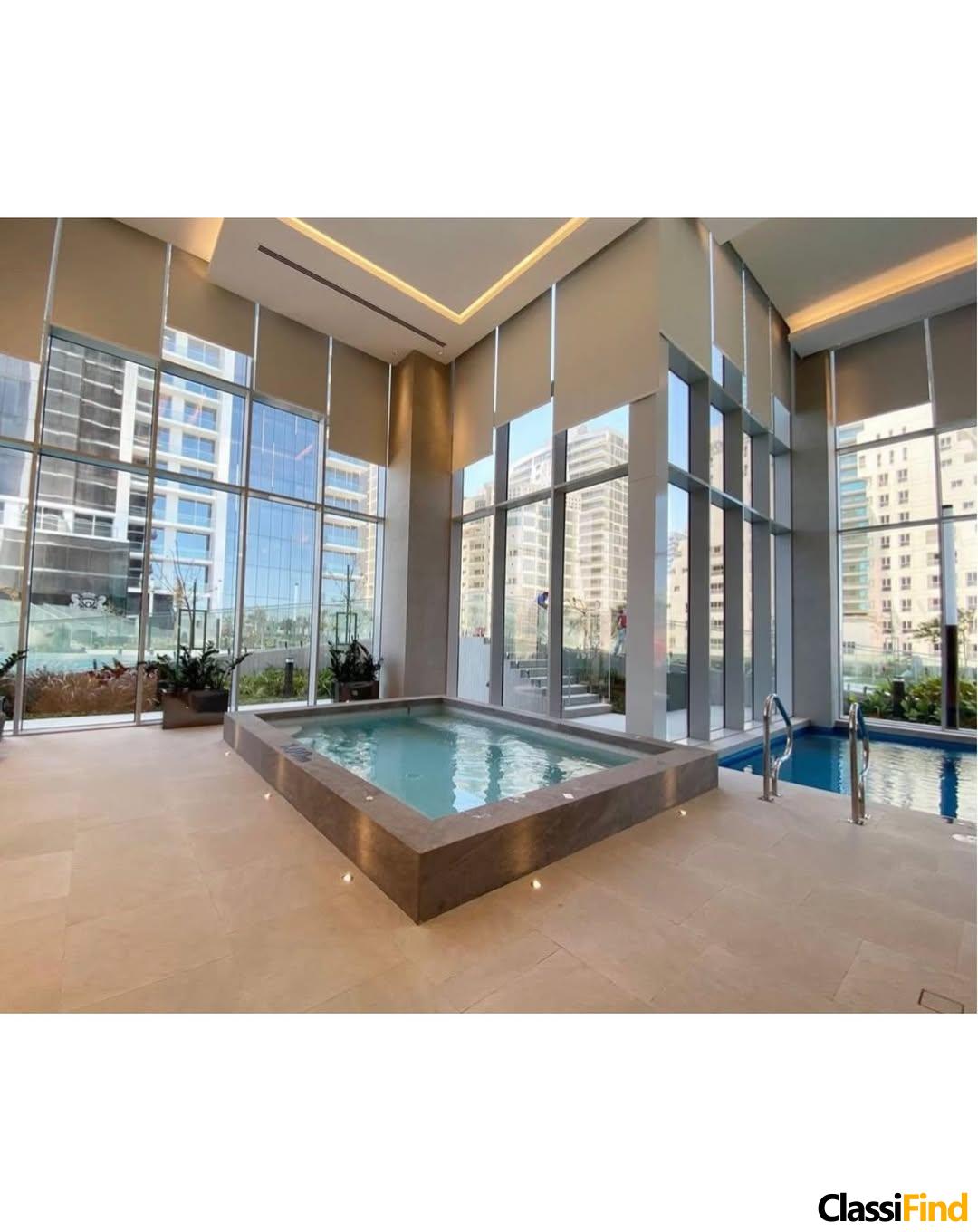 A luxurious, fully furnished studio apartment with a sea view