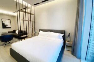 A luxurious, fully furnished studio apartment with a sea view