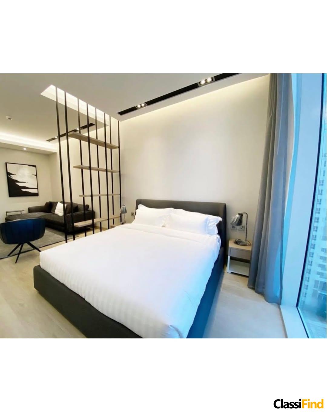 A luxurious, fully furnished studio apartment with a sea view
