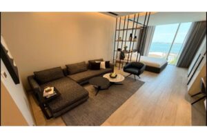 A luxurious, fully furnished studio apartment with a sea view