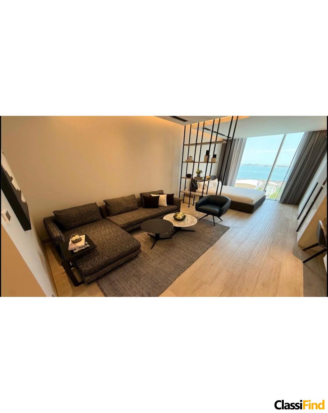 A luxurious, fully furnished studio apartment with a sea view