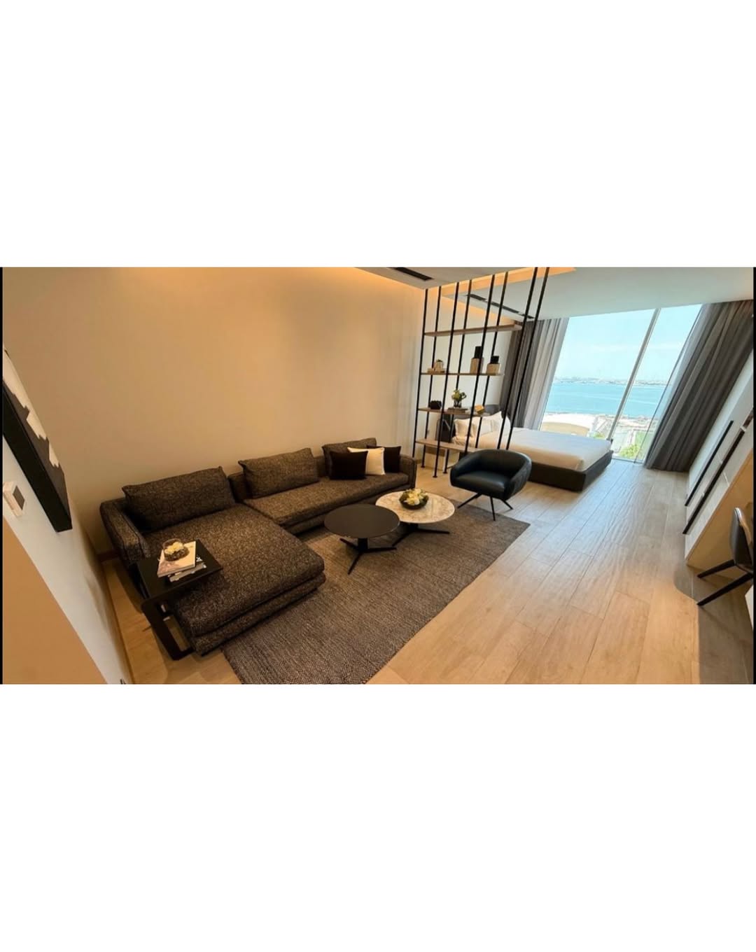 A luxurious, fully furnished studio apartment with a sea view