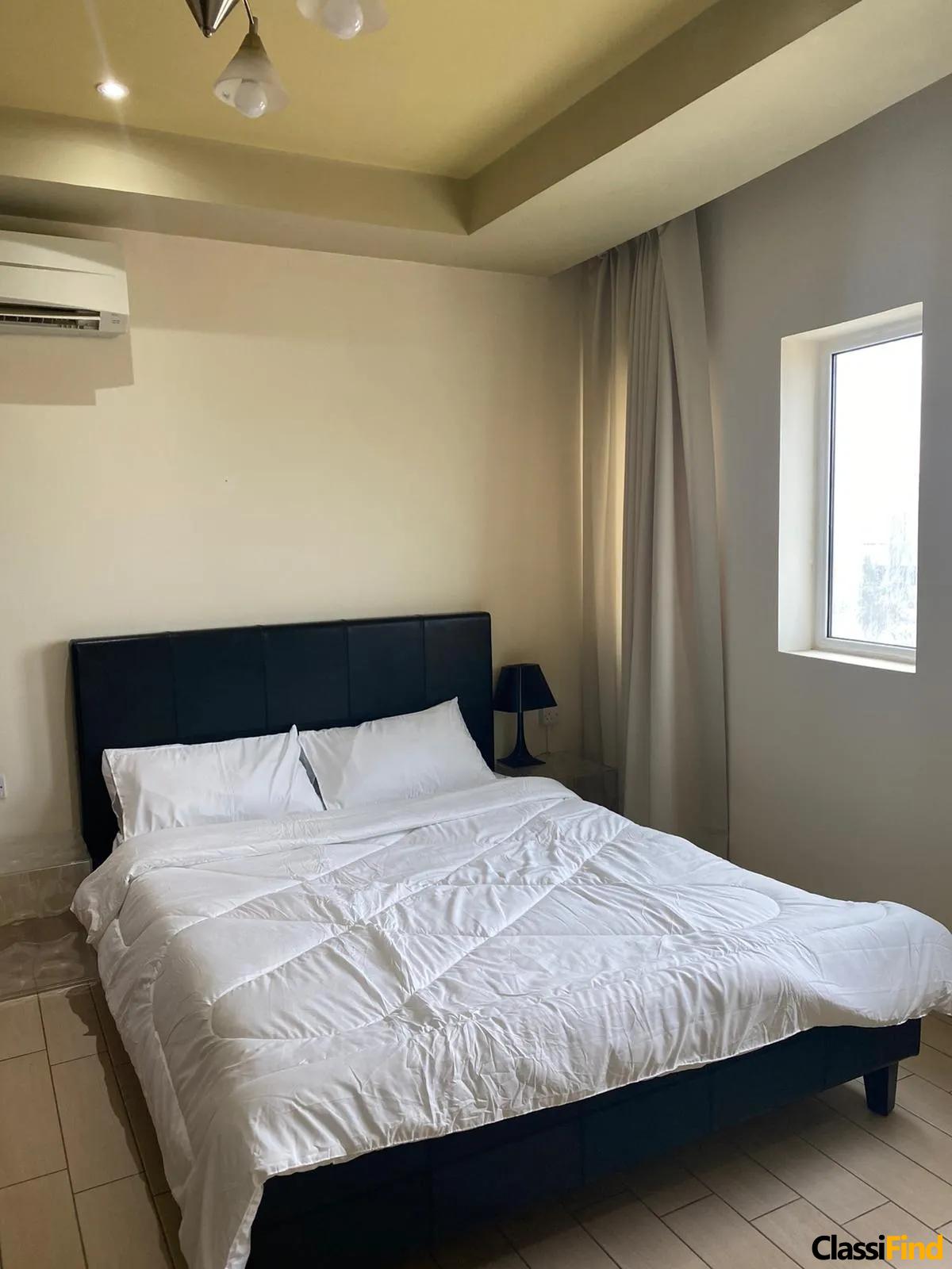 Spacious 2BR Apartment for Rent in Prime Adliya Location with Modern Amenities