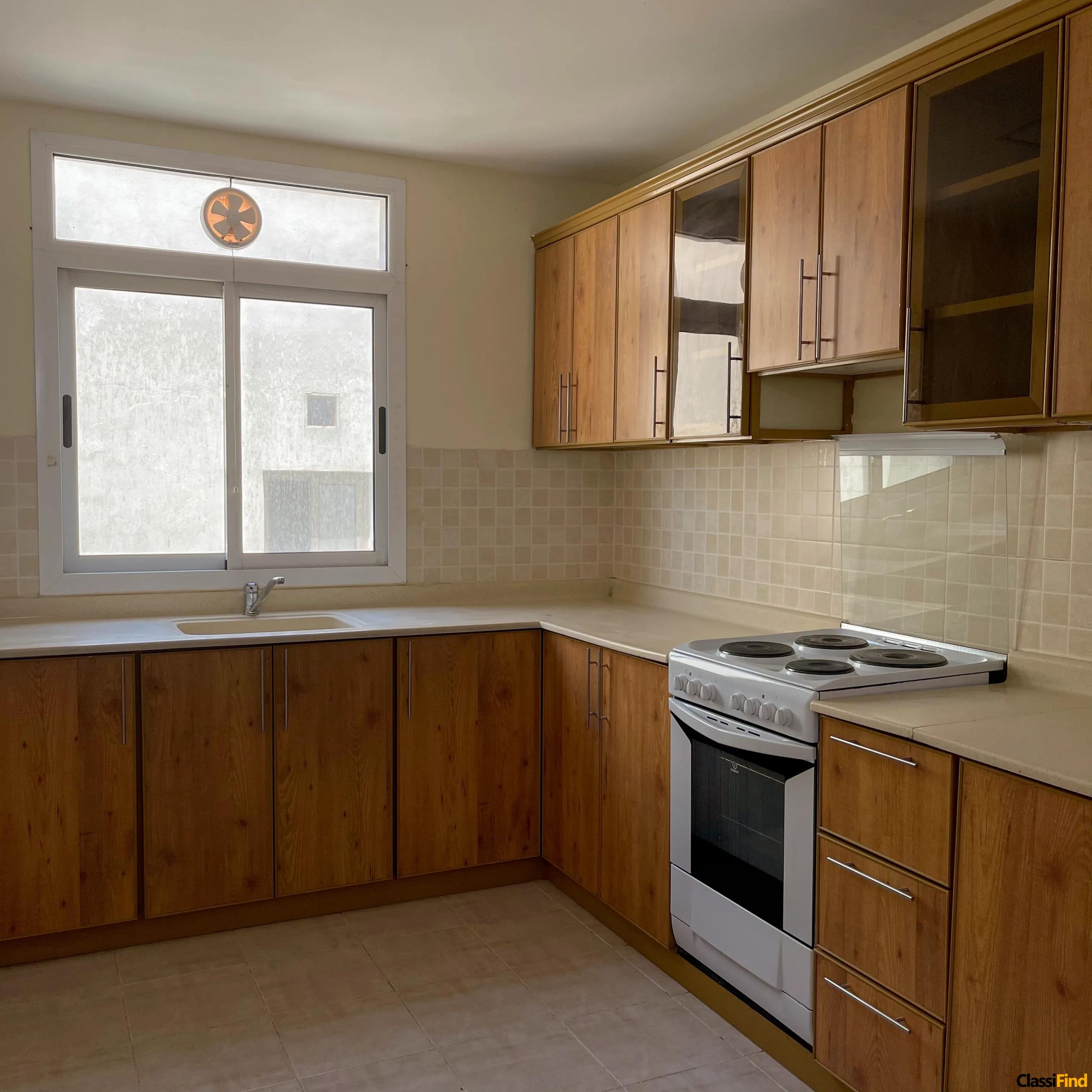 Spacious 2BR Apartment for Rent in Prime Adliya Location with Modern Amenities