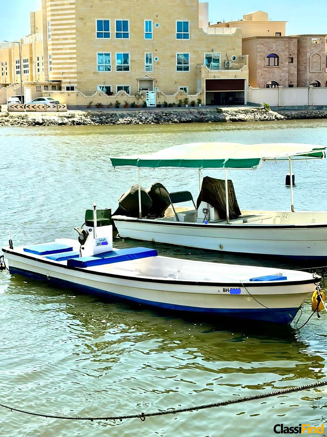 23-foot registered boat with a coaster and steering wheel