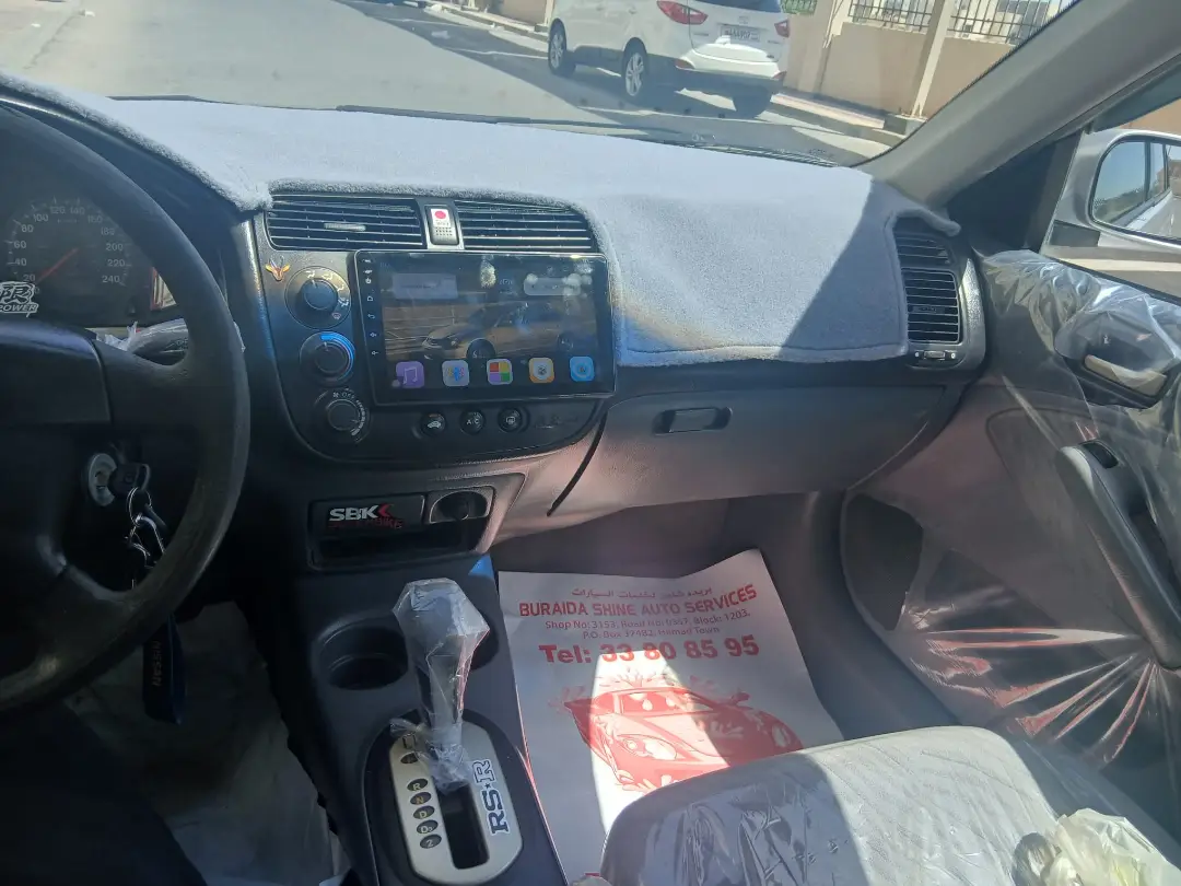 For sale: Honda Civic, 2003 model.