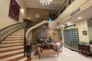 A spacious villa in a prime location in A’ali, situated on a corner plot with access from two roads, offering generous living spaces and a practical layout.
