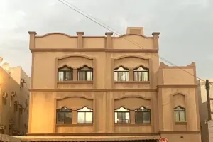 Residential Building with Ground-Floor Villa & 4 Rented Apartments – East Riffa
