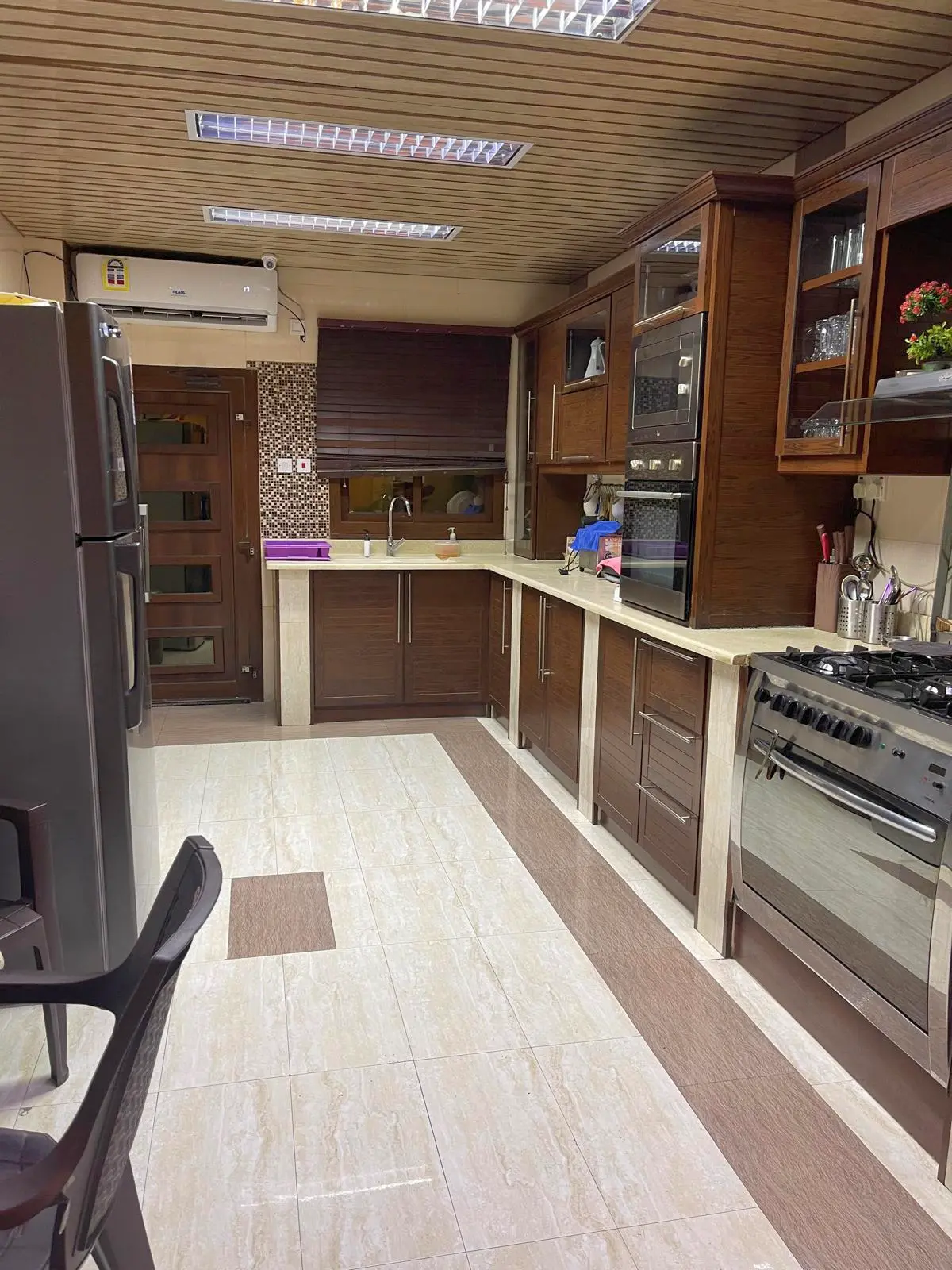 Residential Building with Ground-Floor Villa & 4 Rented Apartments – East Riffa