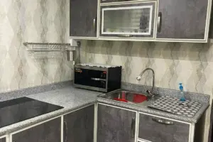 Residential Building with Ground-Floor Villa & 4 Rented Apartments – East Riffa