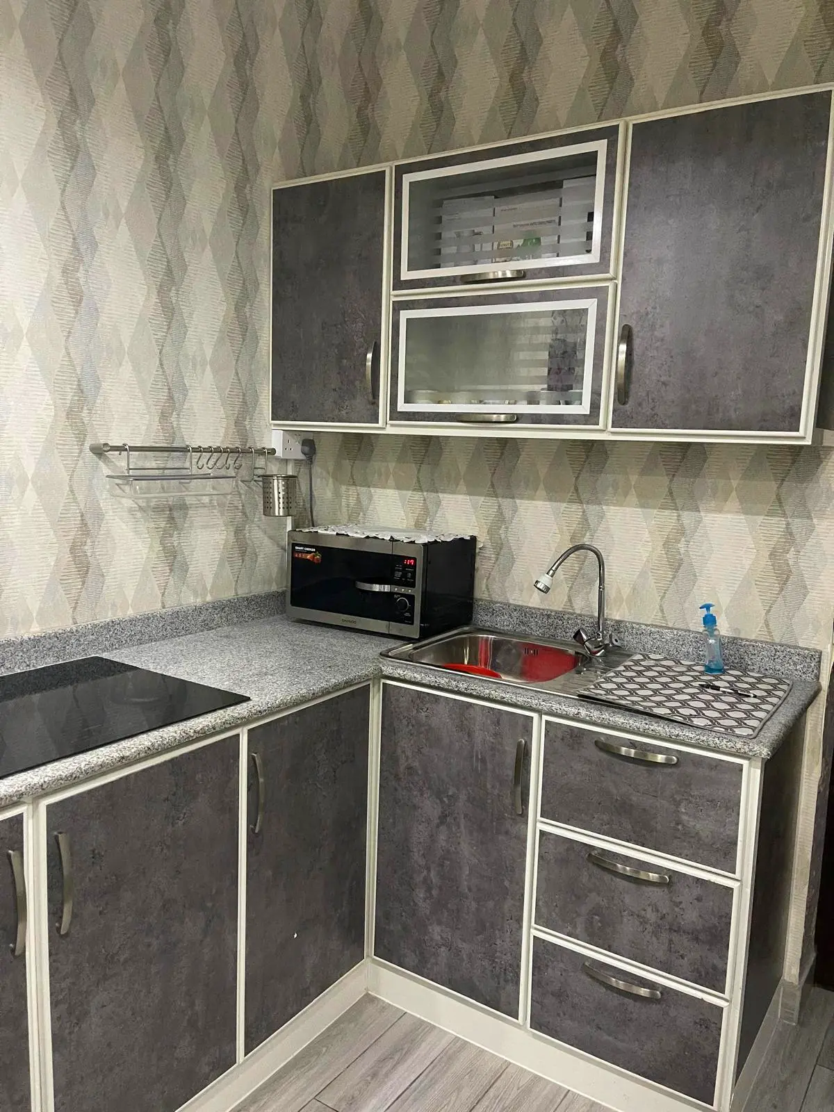 Residential Building with Ground-Floor Villa & 4 Rented Apartments – East Riffa