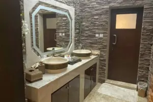 Residential Building with Ground-Floor Villa & 4 Rented Apartments – East Riffa
