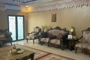 Residential Building with Ground-Floor Villa & 4 Rented Apartments – East Riffa