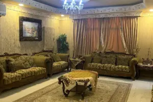 Residential Building with Ground-Floor Villa & 4 Rented Apartments – East Riffa