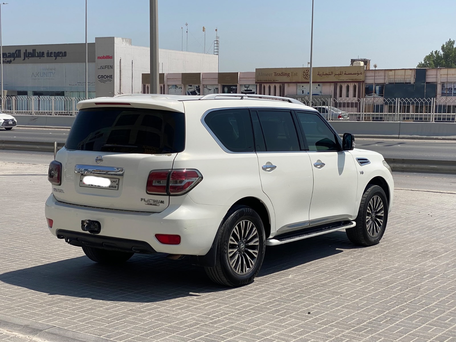 Nissan Patrol Platinum 2013 (أبيض)